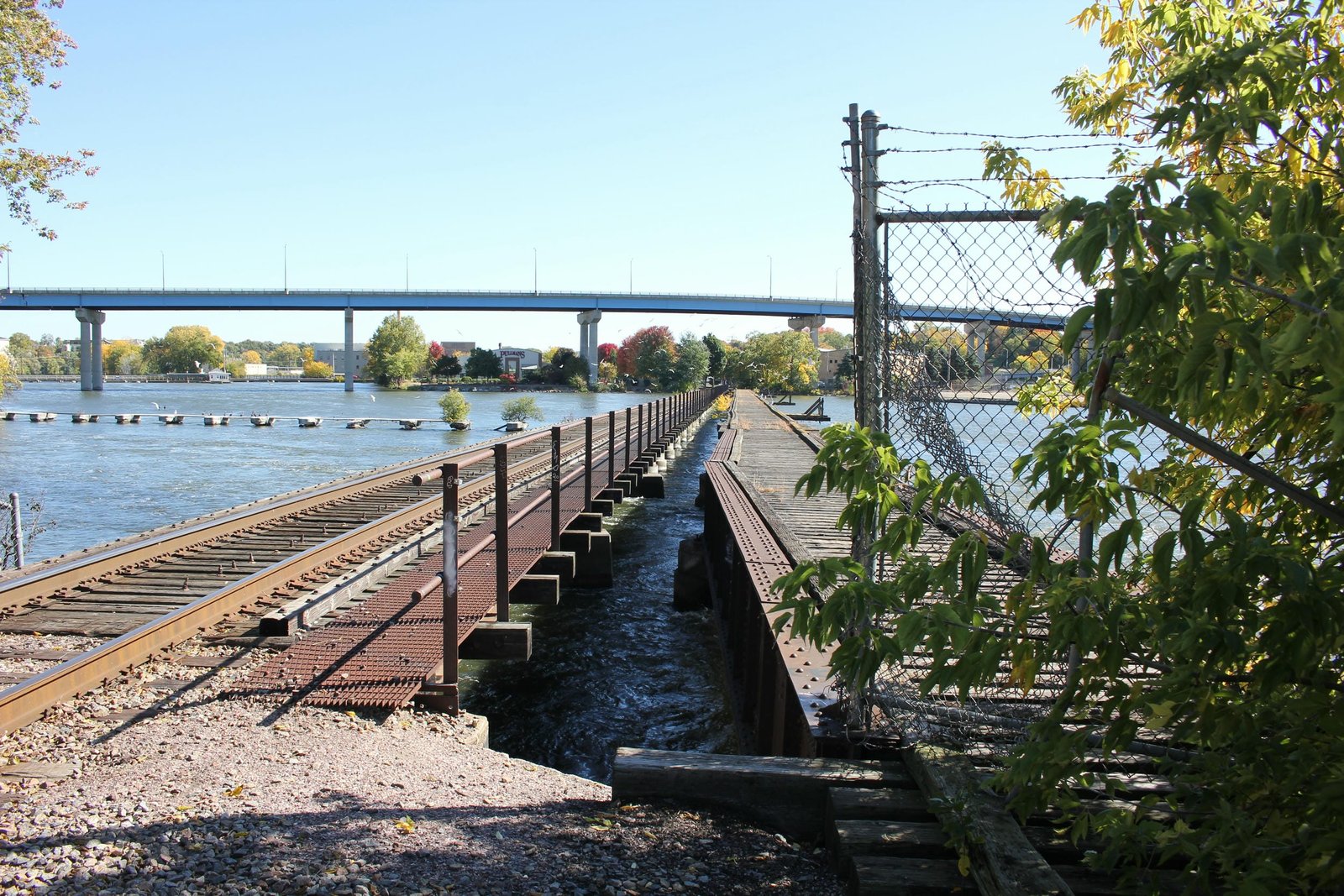 Looking east.  Milwaukee Road bridge on right, C&NW bridge on left